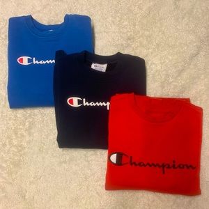 3 sweatshirts (red, light and dark blues), boy medium size.